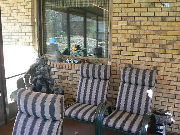 Screened in back patio area.