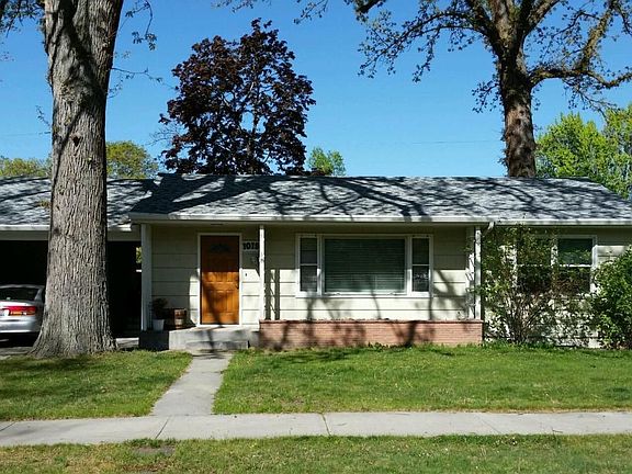 Front View with oversize Carport
