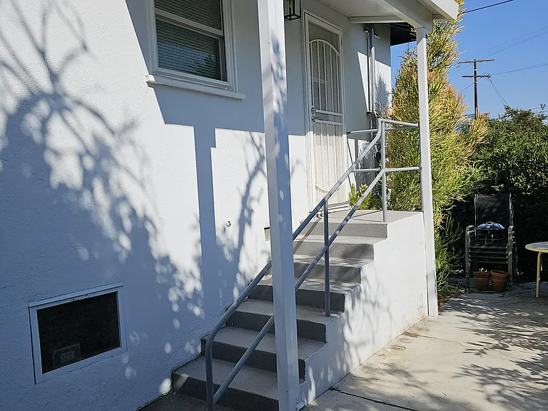 Outside of rear area of 3100 Norwich Ave.