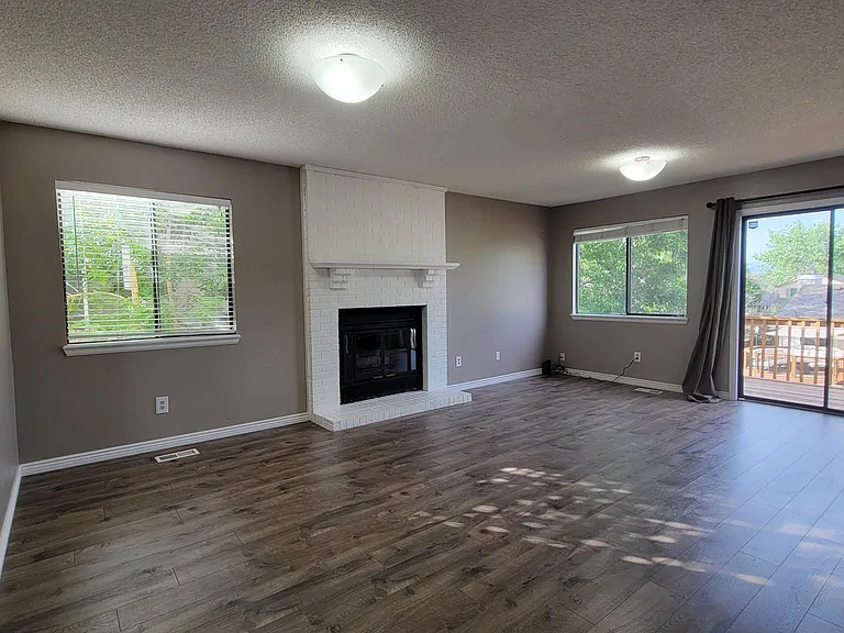 Spacious family room with lots of natural light.