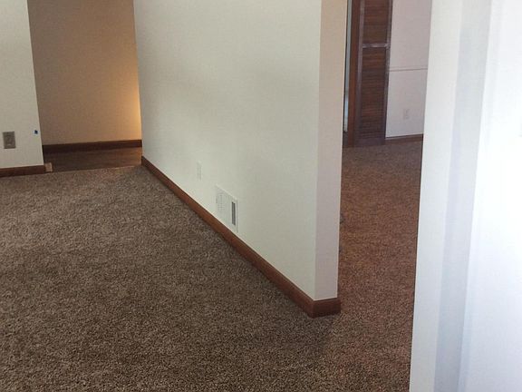 View from entry- living room to family room & hall
