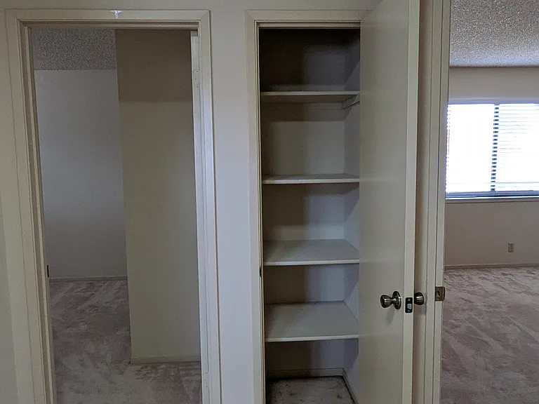 Upstairs hall small linen closet ( 24" x 24")