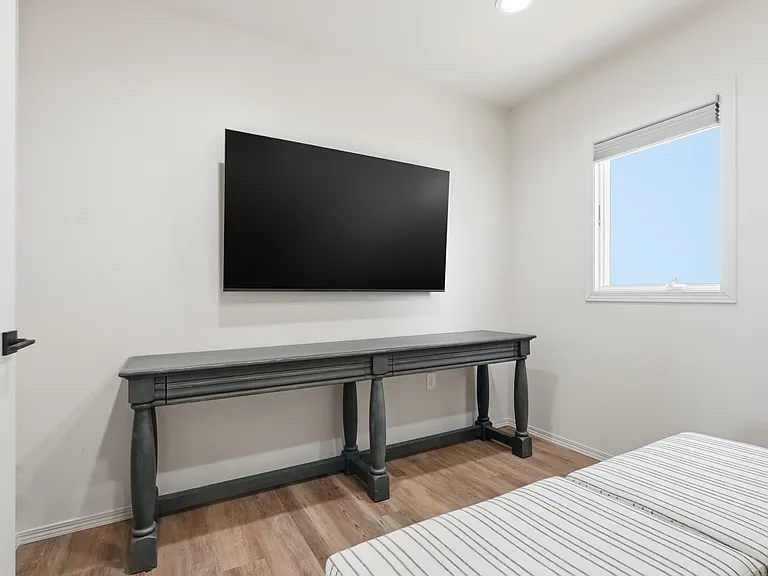 TV in sitting room/bedroom on main level.