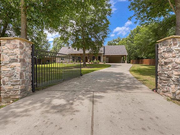 One of the beautiful stone entrances to the property and main home.