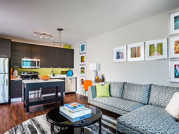 Sustainable wood plank-style flooring throughout