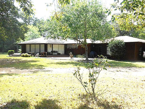 FRONT VIEW OF HOME-WRAP AROUND DECK