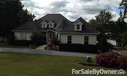 Front View from Lakewood Drive
						:
						Road view is absolutely stunning with double front doors and two bay windows