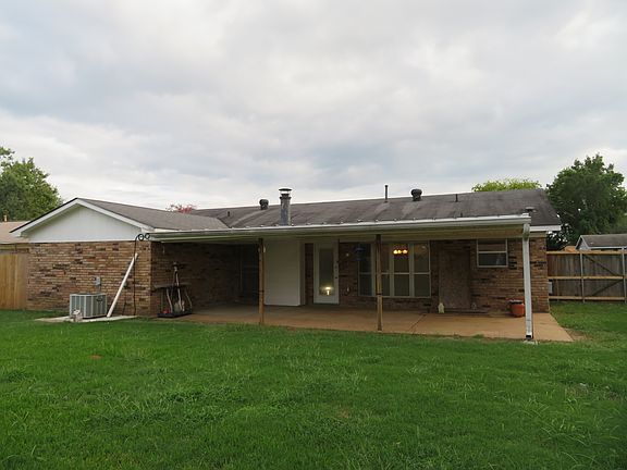 Back view with covered patio