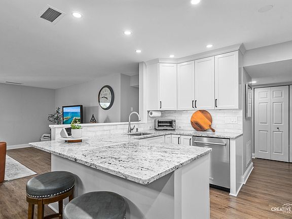 4th image of 6585 Main St APT 404
