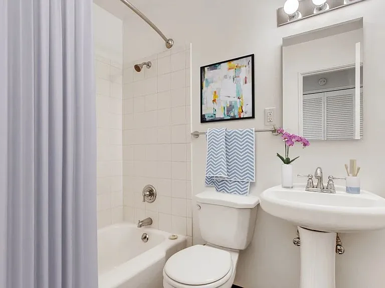 Bathroom with tub sink and toilet