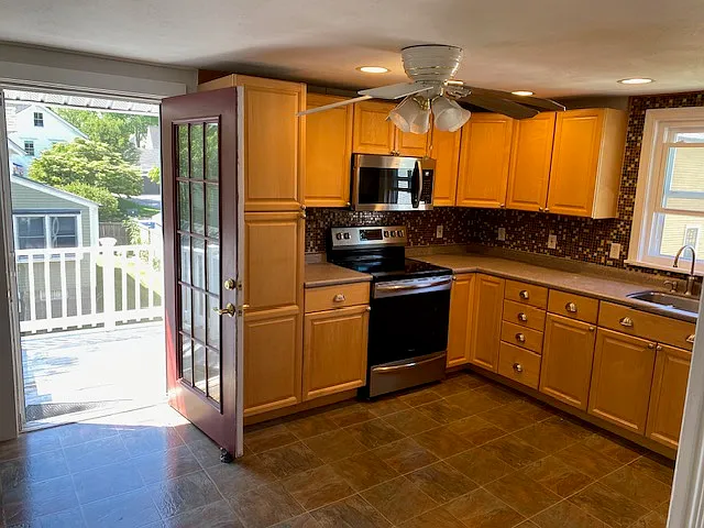 Kitchen/eating with door to 2nd floor deck