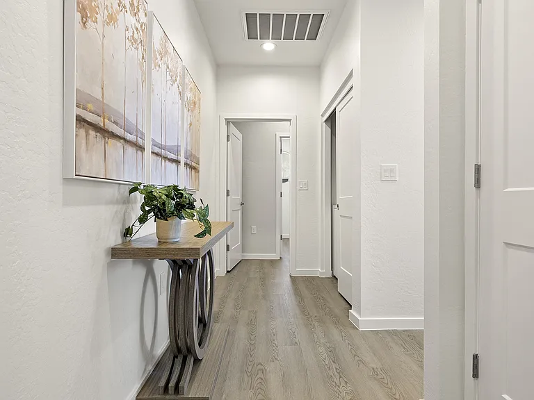 Upstairs hallways with in-unit washer and dryer