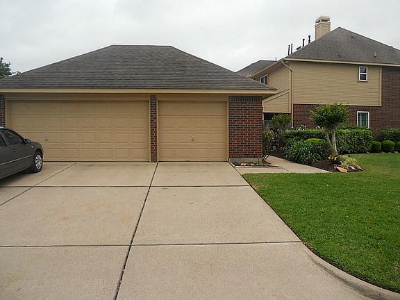 Three car detached garage with side entry