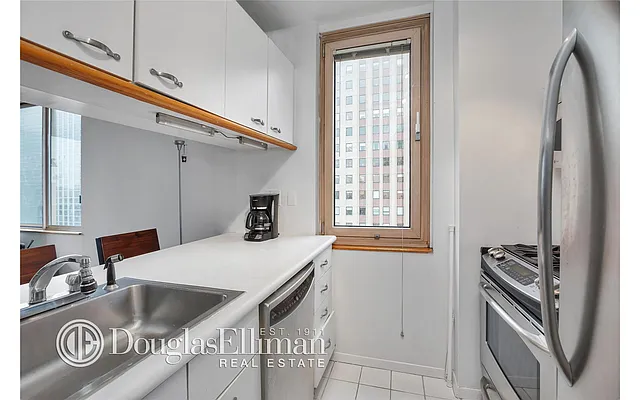 Sold by Douglas Elliman | media 12