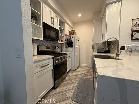 5th image of 10620 Lakeside Dr N #281