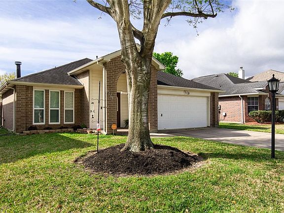 Here is another view of the home which also has a two car attached garage.
