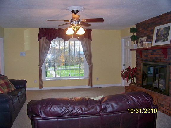 Den w/brick FP & Bay window