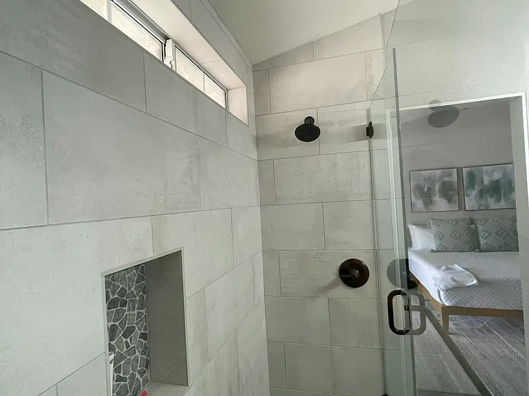 Primary bath shower with modern accents