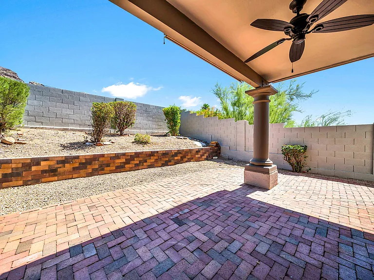 Back patio with ceiling fan