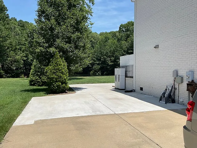 Extended concrete to back-yard