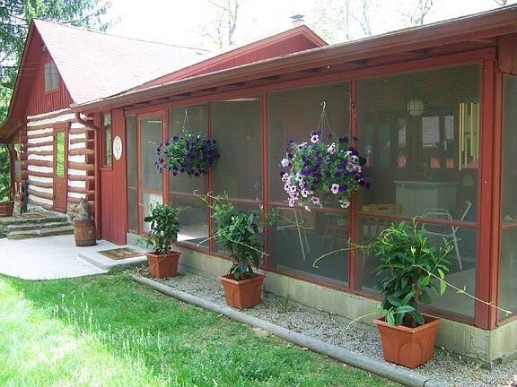 A great 3 season screened porch for relaxing in your own private retreat.