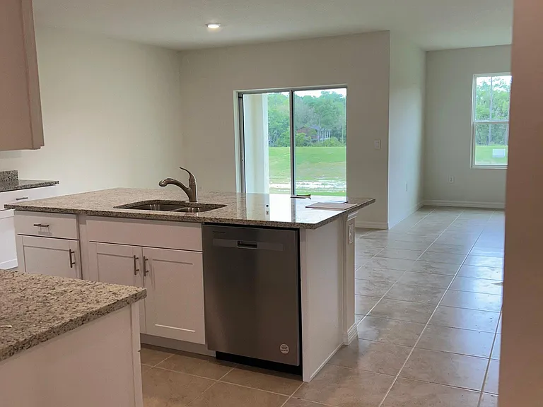 Enjoy a newer home which backs up to a conservation area with no rear neighbors. Super quiet back patio, perfect for grilling out!