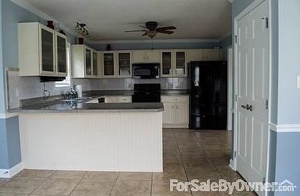 Kitchen
						:
						Newly refinished Merillat cabinets!