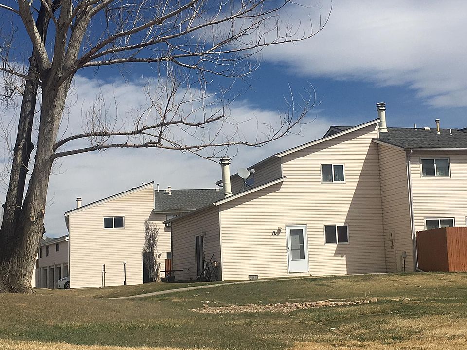 South facing door ,Private End Unit abuts Grassy areas with beautiful trees and views!