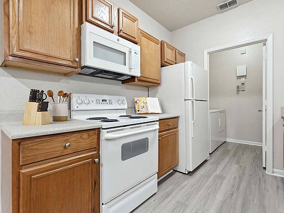 Kitchen with white appliances