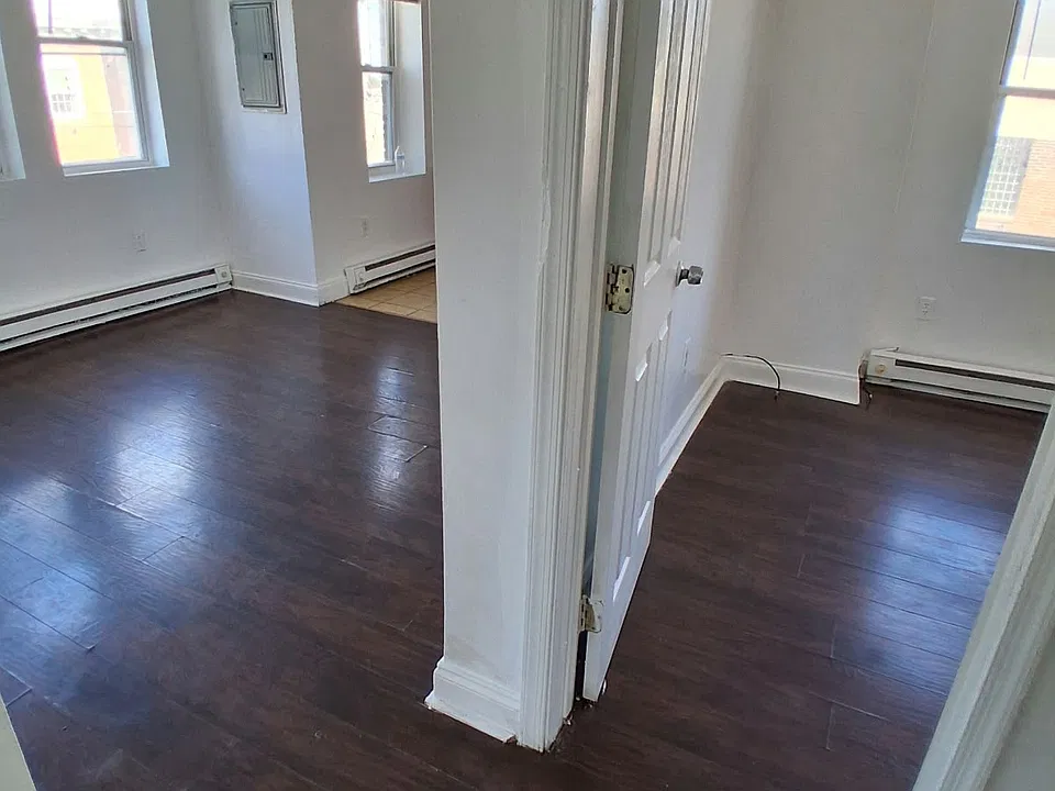 Entry to living room and second bedroom.