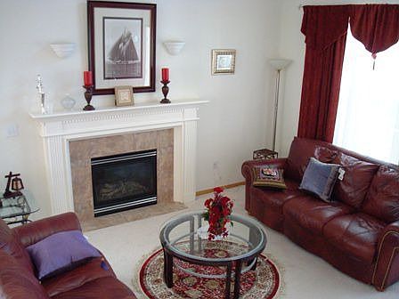 Elegant living room with gas fireplace.