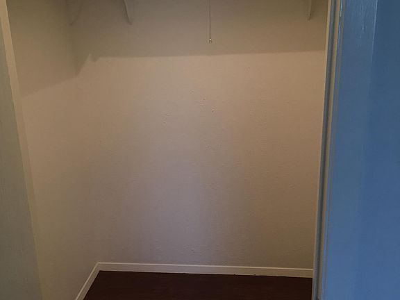 large walk in closet in master bedroom