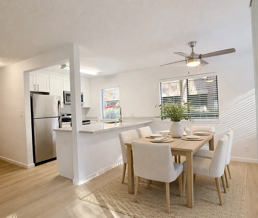 Dining Area and Kitchen - Remodeled Unit - AI Staged
