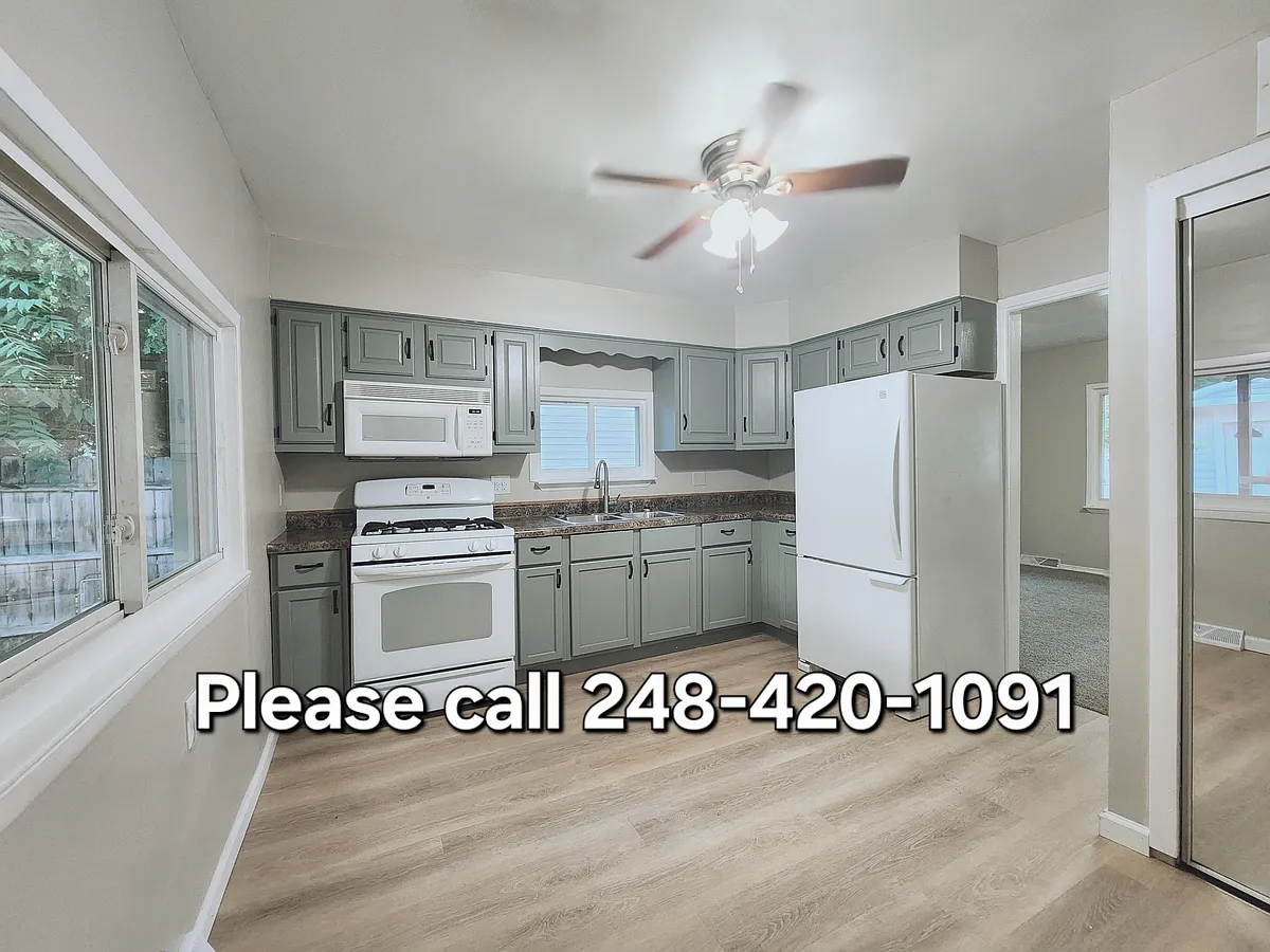 Updated kitchen with appliances provided for convenience - 15334 Oldham St