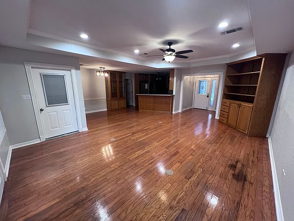 SPACIOUS living and dining area with beautiful real WOOD FLOORS!