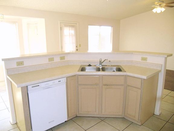 Kitchen Overlooks Family Room