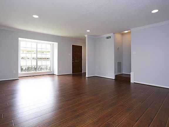 Another view looking back toward the front of the property showing the new solid wood door and bay w