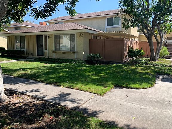 Front View with Covered Fenced Patio