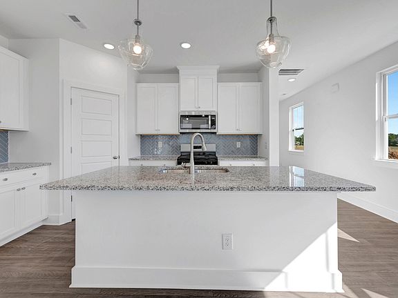 3rd image of 32 Serpens Dr #220
