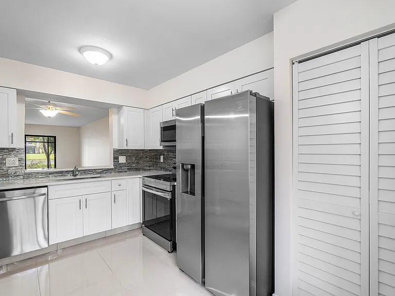 7290 Kinghurst Dr #106 — Photo 16