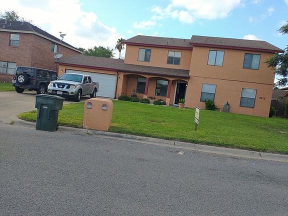 Front View weird double driveway and shared garage