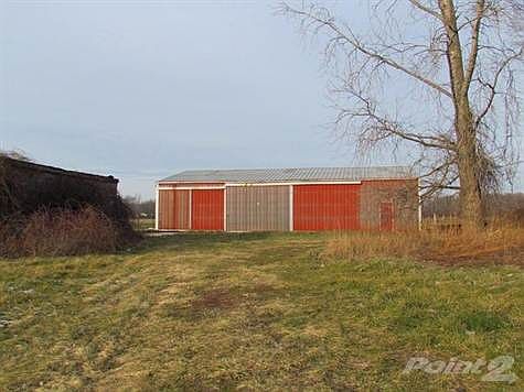 Nice metal barn with plenty of space.  approx. 38' x 63' building.