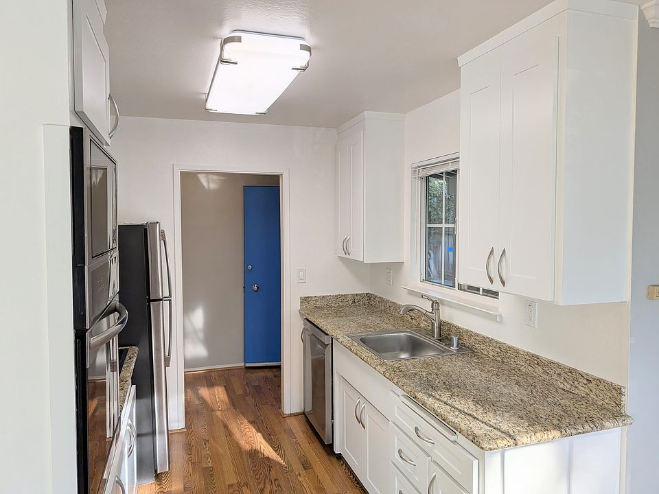 Refreshed kitchen with soft-close cabinet doors.