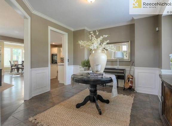 A slate tile floor warms up the formal dining room.
