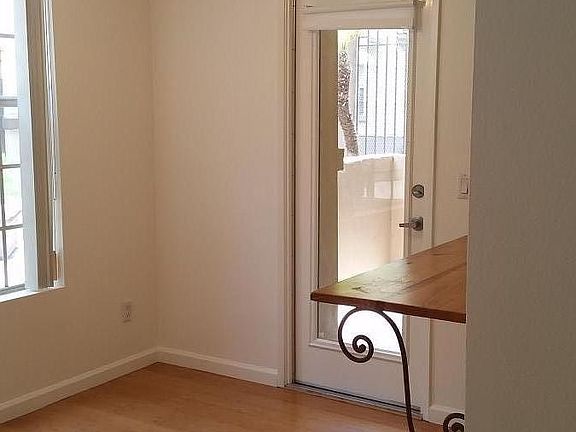 Dining area/eating bard toward adjacent patio