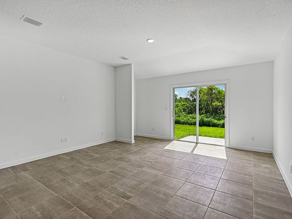 Great room of the Everglade plan at Lakes at Bella Lago.
