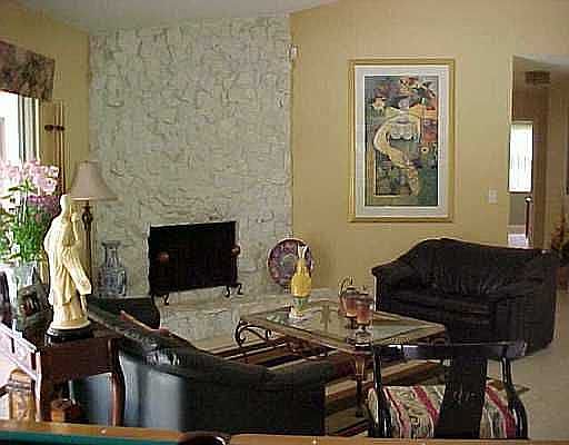 FAMILY ROOM WITH STONE FIREPLACE