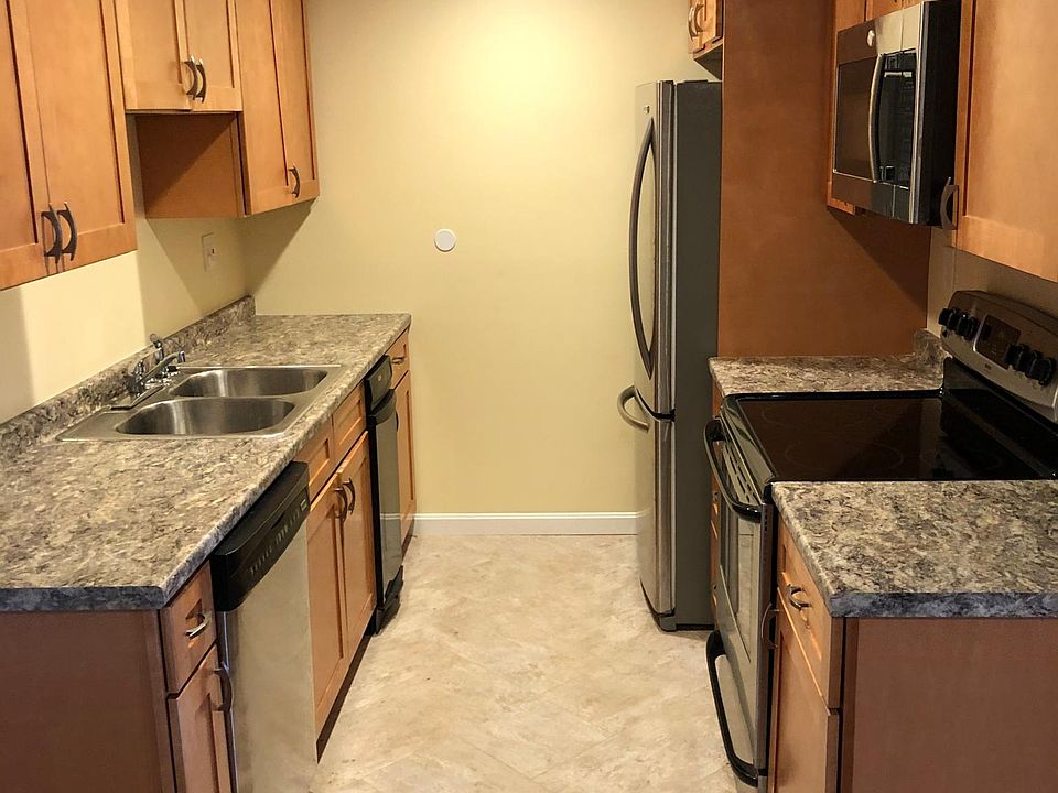 all new kitchen cabinets and flooring.