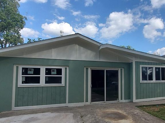 This is the front of home. Pic is before 6 foot fence was built.