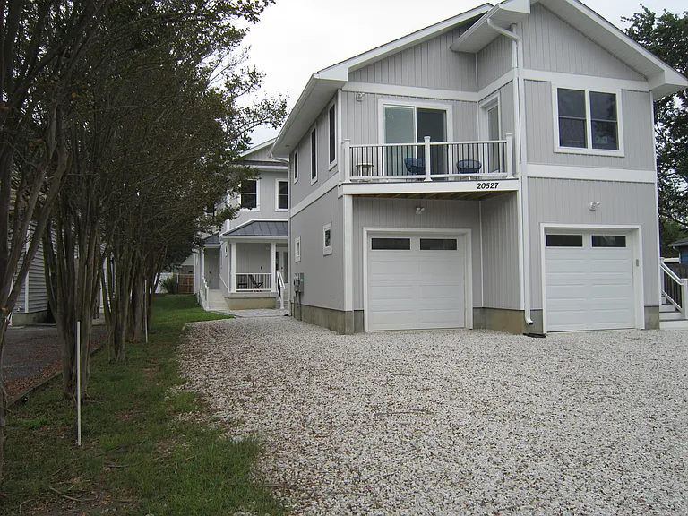 Exterior street view w/ balcony